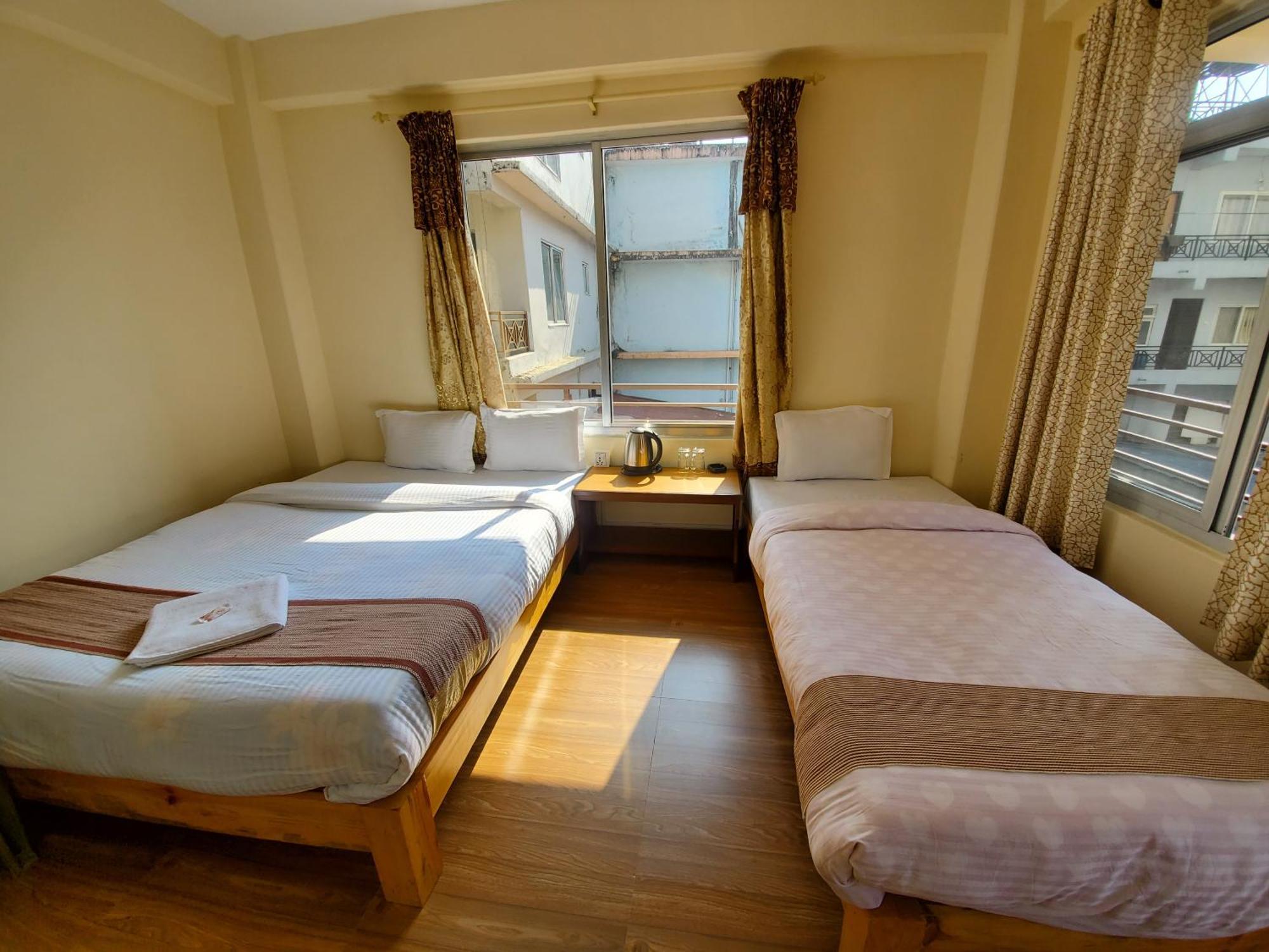 Santoshi Guest House, Pókhara Pokoj fotografie